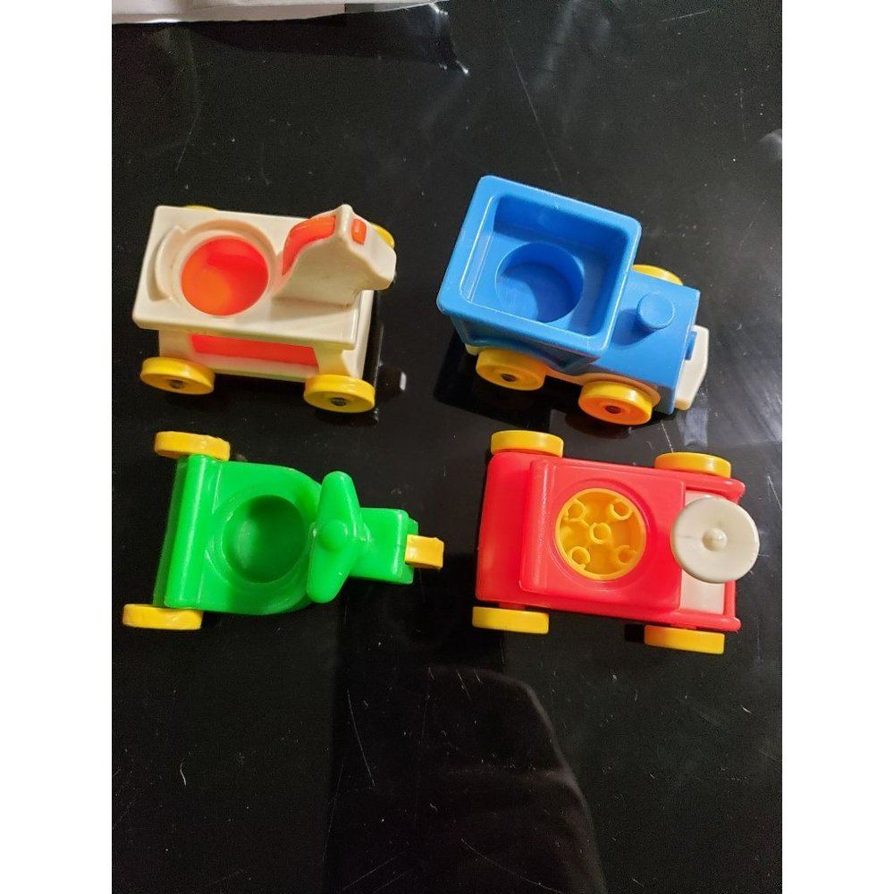Vintage Fisher Price toy rocking horse, bike, train car 4 piece‎ lot